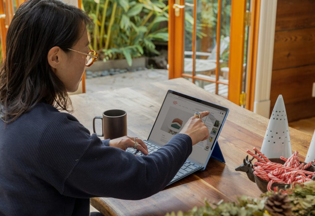 a woman using a laptop