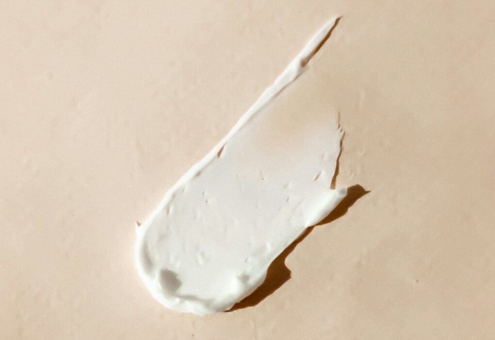 white cotton buds on white surface