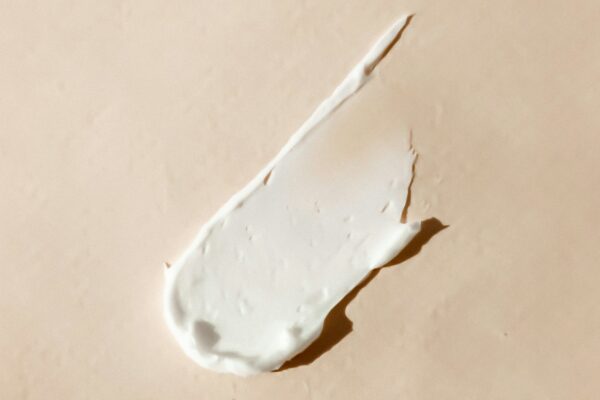 white cotton buds on white surface