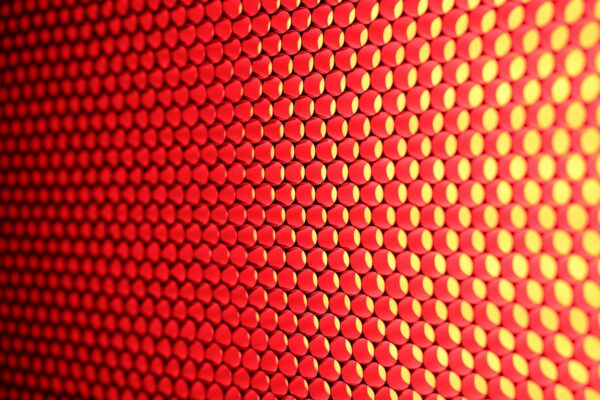 a close up of a red and yellow background